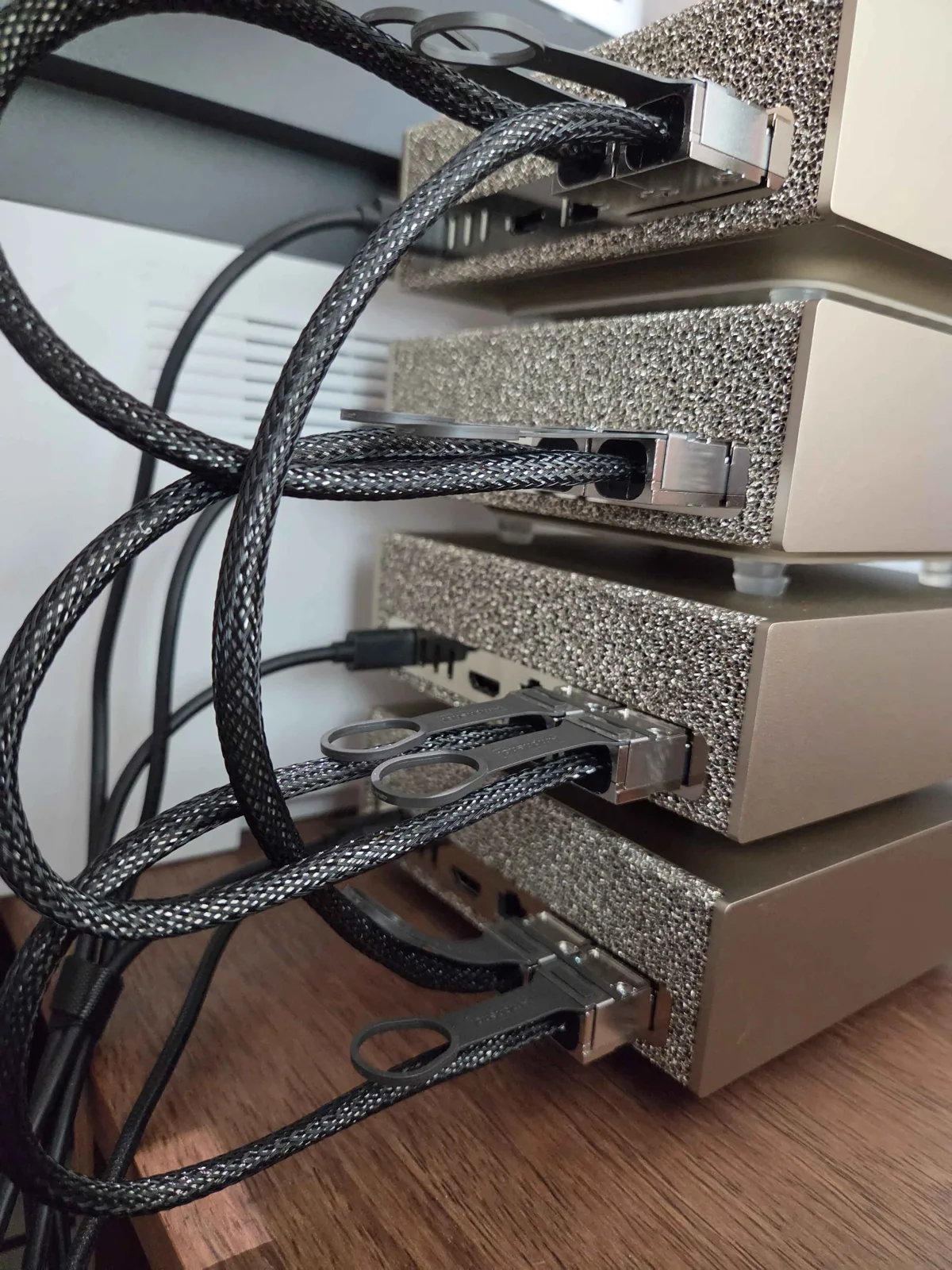 QSFP DAC cables forming a ring on the back of the stack